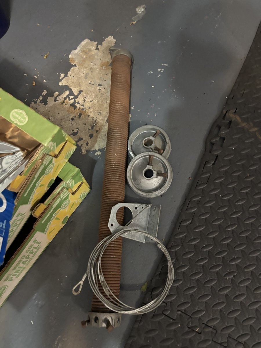 Winding bars and spring repair tools laid out at a job